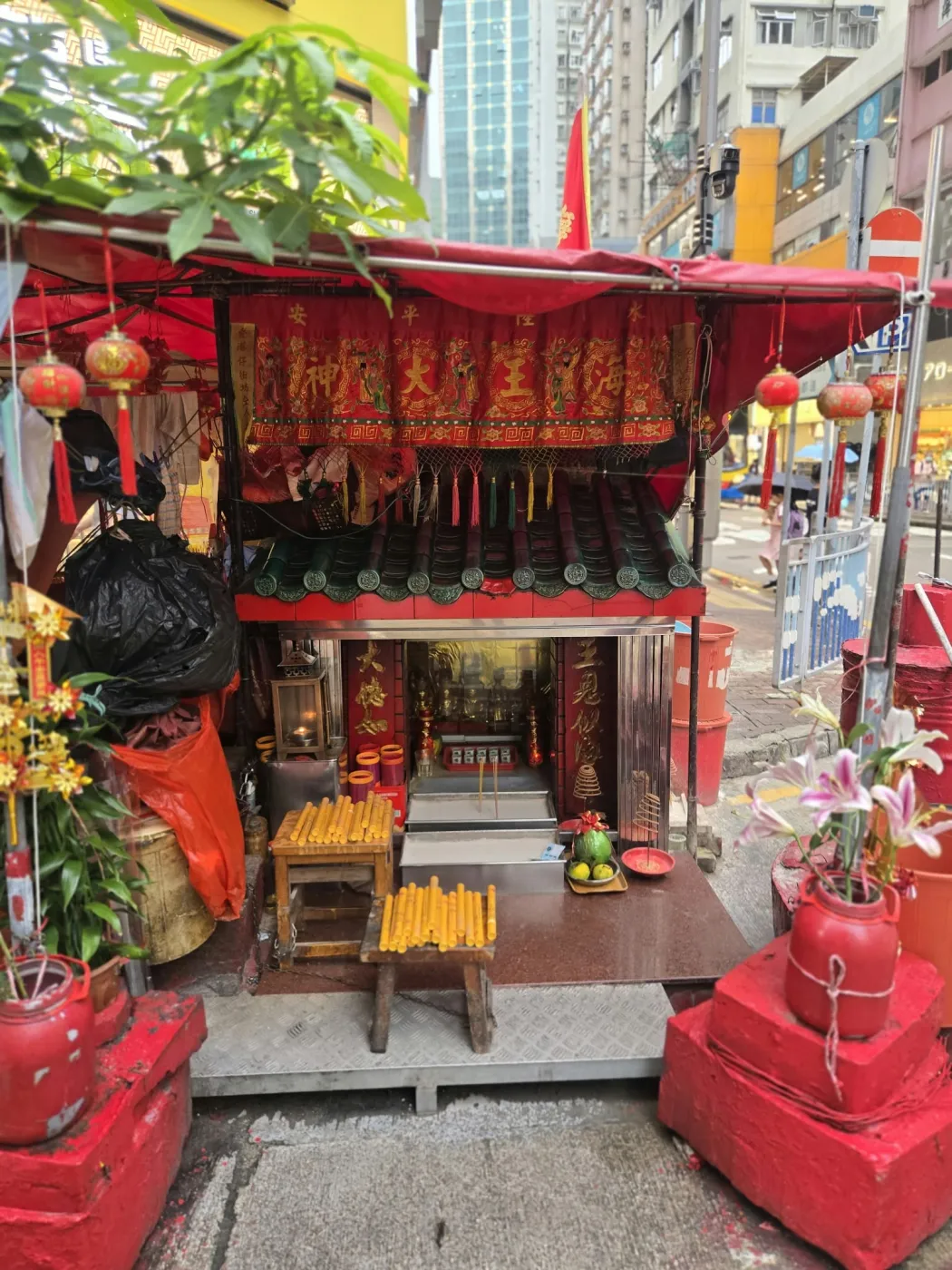 A Hong Kong street shrine stocked with SubstitOud incense